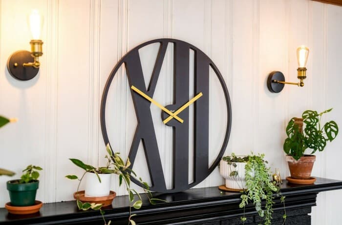 Horloge murale moderne noire et dorée grand diamètre 50 ou 70 cm Bons plans : Nouveauté Disponibilité : Expédié sous 1 semaine, Expédié sous 2